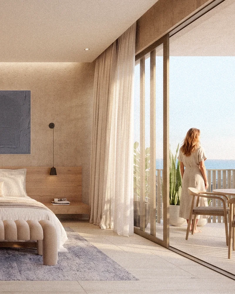 Residence master bedroom opening onto the ocean-view balcony